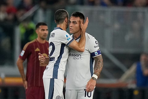 Serie A 2024-25: Inter Milan's Lautaro Martinez, right, celebrates after scoring the opening goal