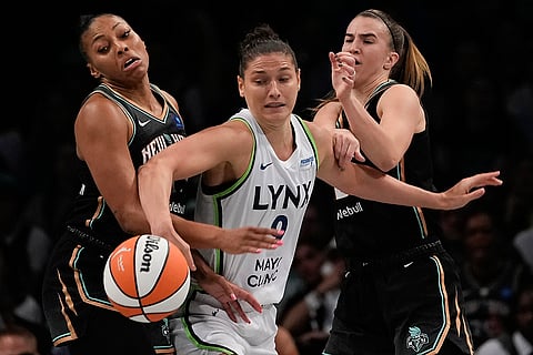 WNBA Finals: Minnesota Lynx forward Cecilia Zandalasini (9) battles for a loose ball against New York Liberty
