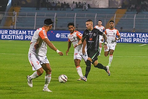 ISL 2024-25: Alexis Nahuel Gomez (centre) of Mohammedan SC dribbles