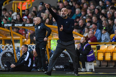 EPL 2024-25: Manchester City's head coach Pep Guardiola gestures during the match
