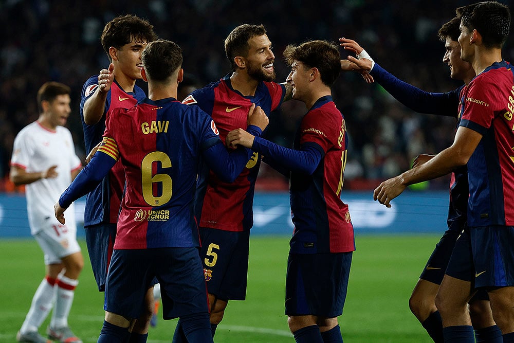 | Photo: AP/Joan Monfort : La Liga 2024-25: Barcelona's Pablo Torre celebrates with teammates after scoring his side's fifth goal 