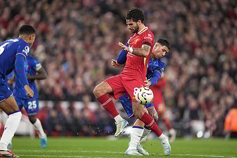 EPL 2024-25: Chelsea's Enzo Fernandez, right, challenges for the ball with Liverpool's Dominik Szoboszlai