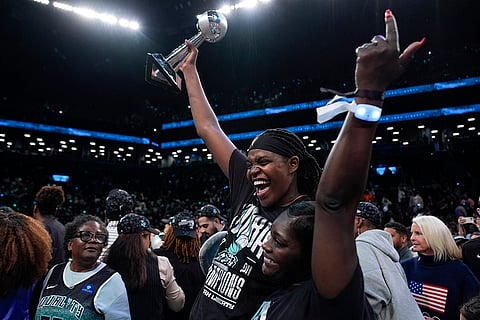 WNBA Finals: New York Liberty forward Jonquel Jones, left, holds up the MVP award