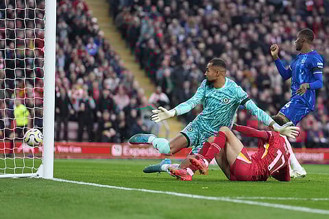 EPL 2024-25: Liverpool's Curtis Jones, right, scores his side's second goal
