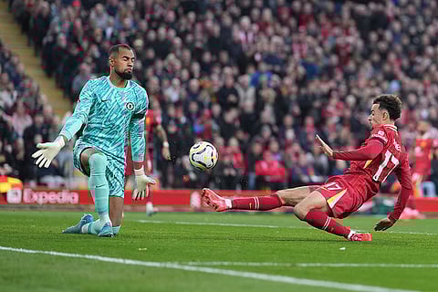EPL 2024-25: Curtis Jones, right, scores his side's second goal