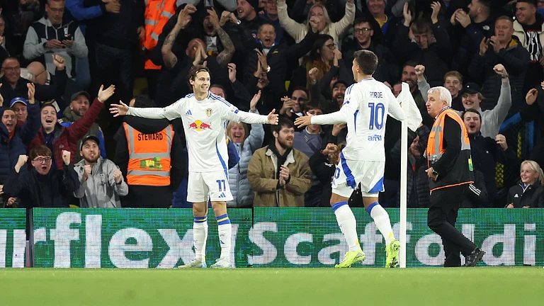 Brenden Aaronson celebrates his early finish for Leeds United on Tuesday. - null