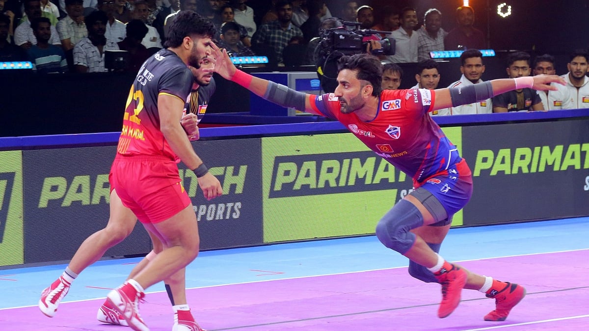 Special Arrangement : UP Yoddhas in action against Bengaluru Bulls in PKL 11