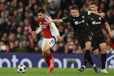 Champions League 2024-25: Arsenal's Gabriel Martinelli, left, duels for the ball with Shakhtar's Mykola Matviyenko