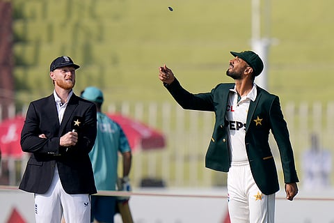 Pakistan vs England 3rd Test: Pakistan's Shan Masood, right, flips the coins for toss as England's Ben Stokes watches