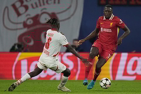 Champions League 2024-25: Liverpool's Ibrahima Konate, right, duels for the ball with Leipzig's Amadou Haidara