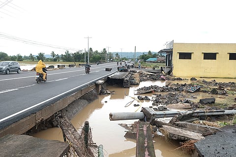 Tropical Storm Trami: Debris from a damaged road in Polangui