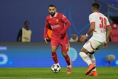 Champions League 2024-25: Liverpool's Mohamed Salah, left, duels for the ball with Leipzig's Benjamin Henrichs