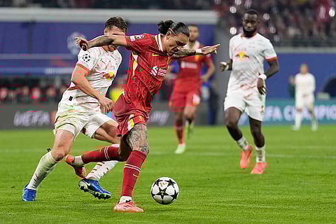 Champions League 2024-25: Liverpool's Darwin Nunez, center, duels for the ball with Leipzig's Willi Orban