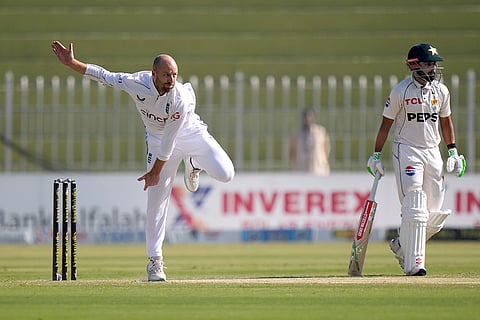 Pakistan vs England 3rd Test: England's Jack Leach, left, bowls as Pakistan's Saud Shakeel watches during the day two