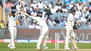 AP : Rohit Sharma, left, and India's Rishabh Pant , centre, appeals unsuccessfully for the wicket of New Zealand's captain Tom Latham, right, during the day two of the second cricket test match between India and New Zealand