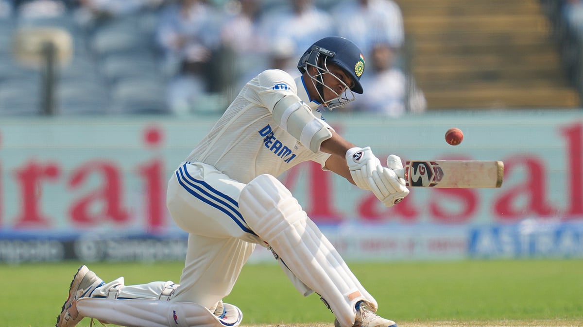 India's Yashasvi Jaiswal plays a shot during day two of the second cricket test match between India and New Zealand at the Maharashtra Cricket Association Stadium, in Pune. - AP Photo/Rafiq Maqbool