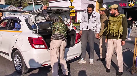 Baramulla: Security personnel check vehicles amid tight security after a recent terrorist attack, at Tangmarg, in Baramulla district, Friday, Oct. 25, 2024.