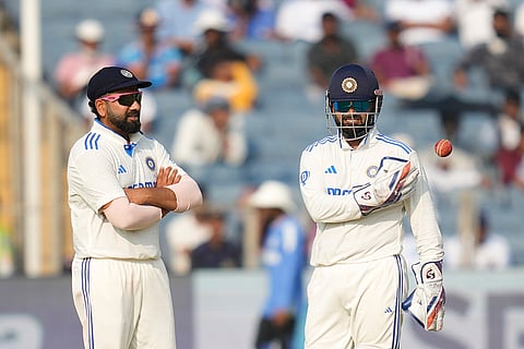 India Vs New Zealand 2nd Test: India's captain Rohit Sharma, left, chats with India's Rishabh Pant during the day two