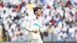Photo: AP/Rafiq Maqbool : India vs New Zealand: Mitchell Santner became only the second New Zealand spinner to take two five-wicket hauls in a Test cricket match.