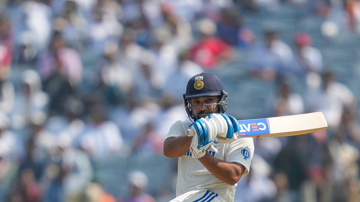 Indias captain Rohit Sharma plays a shot during day three. AP Photo