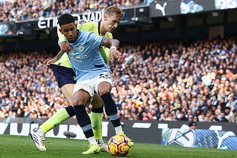 EPL 2024-25: Manchester City's Savinho, front, duels for the ball with Southampton's Flynn Downes