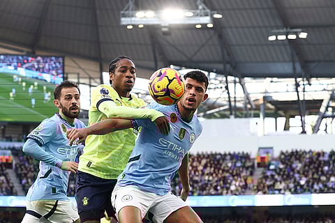 EPL 2024-25: Manchester City's Matheus Nunes, right, duels for the ball with Southampton's Kyle Walker-Peters