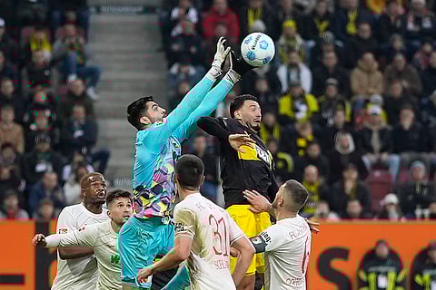 Bundesliga soccer: Augsburg's goalkeeper Nediljko Labrovic makes a save