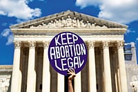 Women's Rights, Abortion Take Centre Stage In 2024 US Elections  Photo: Getty Images : Make it Legit: An abortion rights advocate during a protest outside of the US Supreme Court on June 24, 2024, in Washington, D.C.