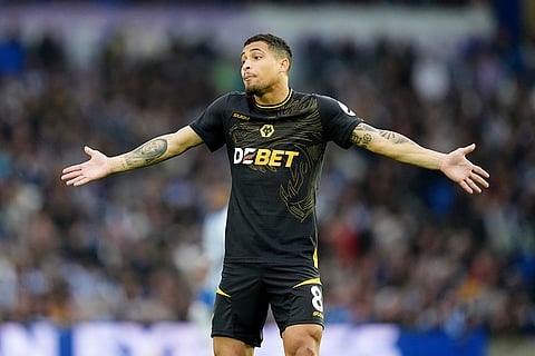 EPL 2024-25: Wolverhampton Wanderers' Joao Gomes gestures