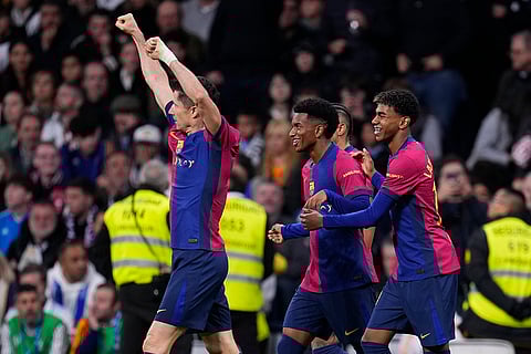 La Liga 2024-25: Barcelona's Robert Lewandowski, left, celebrates after scoring his side's second goal
