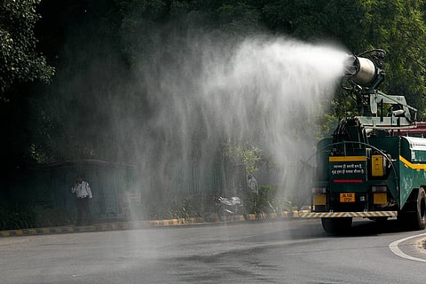 NDMC spray water to curb air pollution