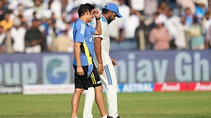 AP/Rafiq Maqbool : India head coach Gautam Gambhir and captain Rohit Sharma react after their loss to New Zealand in the second Test in Pune.