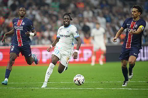 Ligue 1 Soccer 2024-25: Marseille's Jonathan Rowe runs with the ball