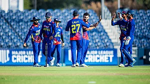 Photo: X | CAN : Nepal national cricket team against the USA in ICC Cricket World Cup League Two match.