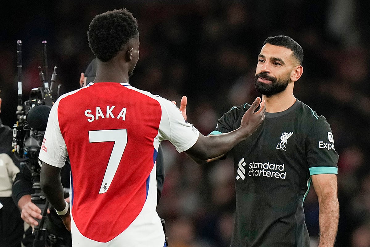 English Premier League soccer Arsenal vs Liverpool photo gallery_Bukayo Saka and Mohamed Salah