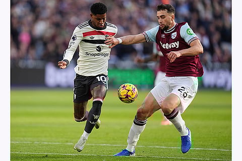 Premier League 2024-25: Manchester United's Marcus Rashford, left, and West Ham United's Max Kilman battle for the ball