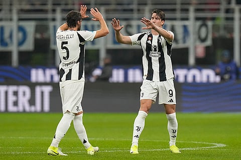 Serie A 2024-25: Juventus' Dusan Vlahovic, right, celebrates with Manuel Locatelli after scoring his side's opening goal