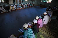 BJP Leader Seeks Mosque Checks And Madrasa Closures In Ayodhya Ahead Of PM Modi’s Visit Getty Images; Representative image : Children reading Quran at a madrasa.