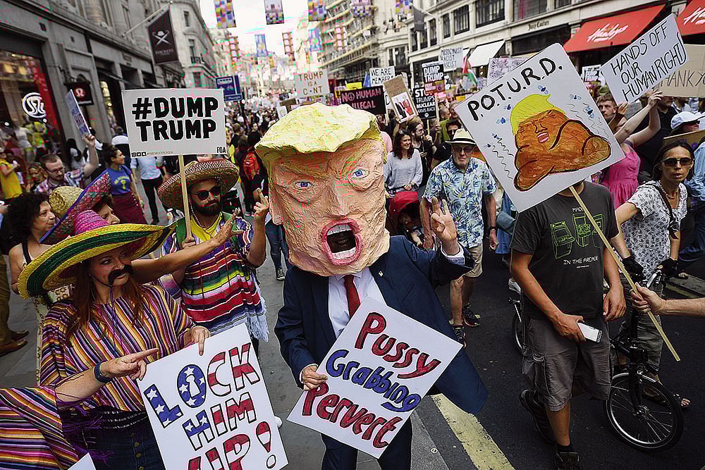 Photo: Getty Images : Dissent Beyond the US: Protesters take part in a demonstration against President Trump’s visit to the UK on July 13, 2018, in London