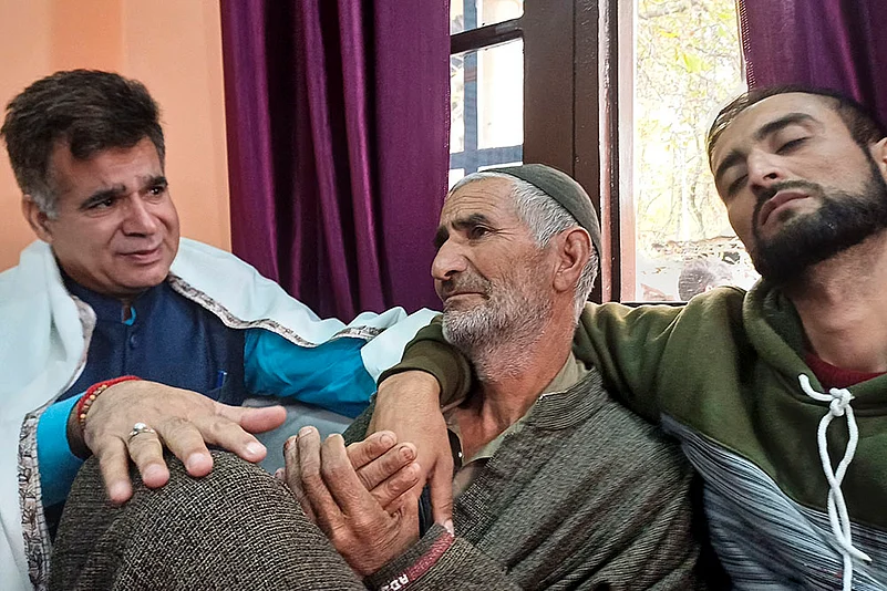 Ravinder Raina meets martyr Kaisar A Shahs family