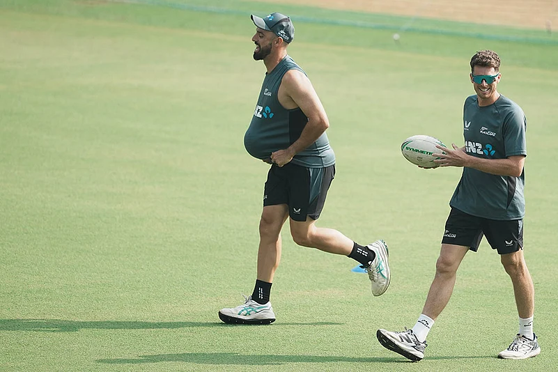 New Zealands Mitchell Santner and Daryl Mitchell