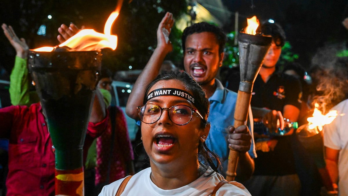 PTI  : (File Image)  Junior doctors in Kolkata participate in torch rally, demanding justice for the RG Kar case