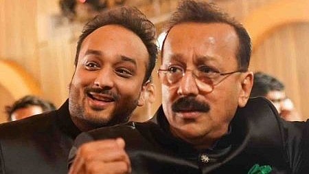 Maharashtra MLA Zeeshan Siddique with his slain father Baba Siddique.(File photo) |