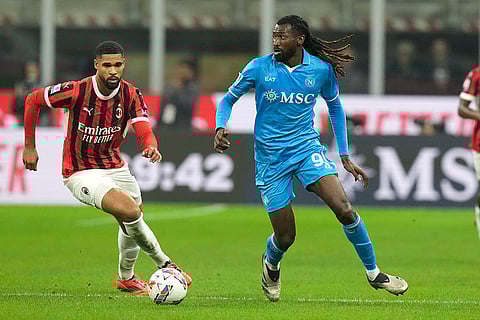 Serie A 2024-25: AC Milan's Ruben Loftus-Cheek, left, and Napoli's Andre-Frank Zambo Anguissa
