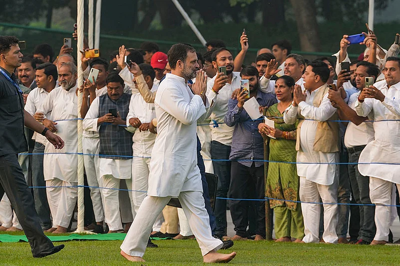Rahul Gandhi greets people after paying homage to former prime minister Indira Gandhi