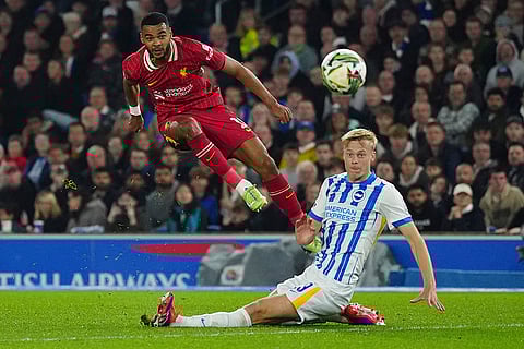 EFL Cup Quarter-Finals: Liverpool's Cody Gakpo, left, shoots for a goal by Brighton's Jan Paul van Hecke
