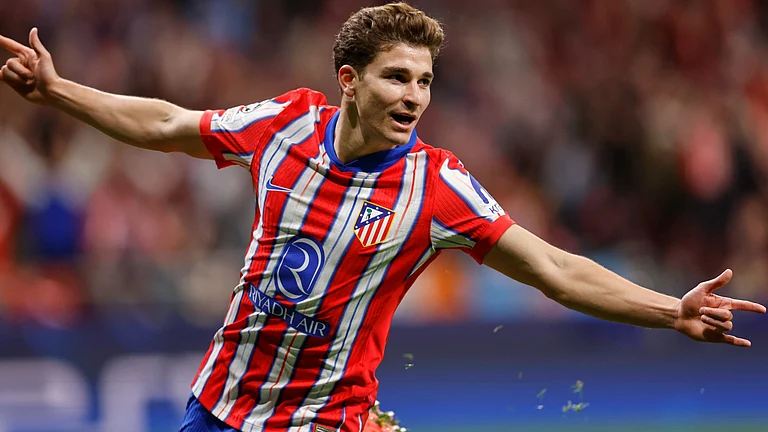 Julian Alvarez scored two goals to help Atletico Madrid advance in the Copa del Rey - null