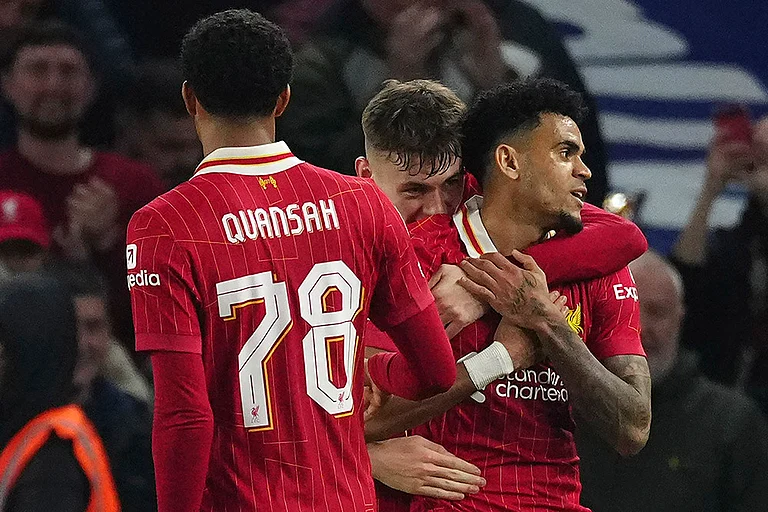 EFL Cup Quarter-Finals: Liverpool's Luis Diaz, right, celebrates with his teammates after scoring a goal - | Photo: AP/Dave Shopland
