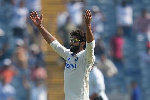 India's Ravindra Jadeja celebrates the dismissal of New Zealand's Tom Blundell during the day three of the second cricket test match between India and New Zealand at the Maharashtra Cricket Association Stadium , in Pune, India, Saturday, Oct. 26, 2024. 