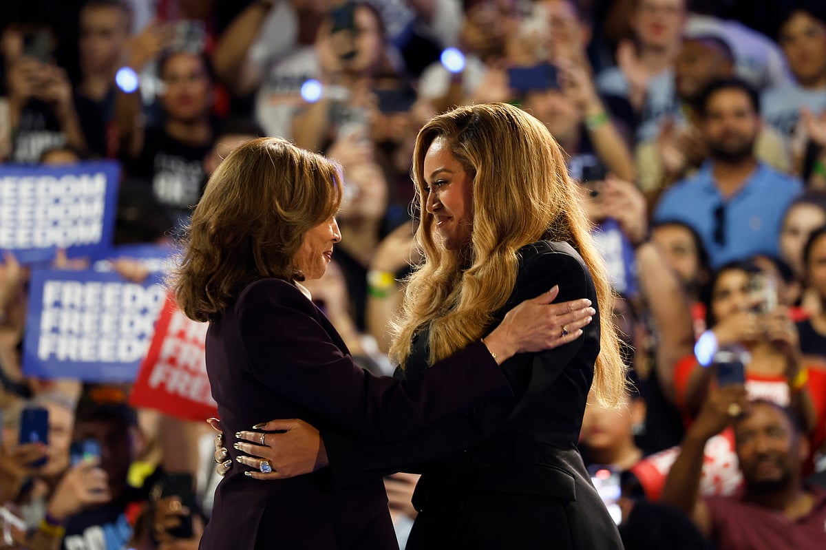 Beyonce, right, and Democratic presidential nominee Vice President Kamala Harris, left, embrace on stage during a campaign rally Friday, Oct. 25, 2024, in Houston. - AP Photo